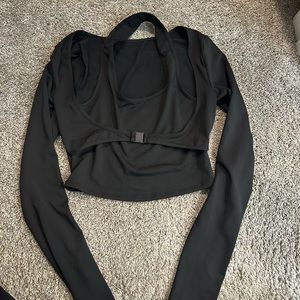 Two different SHEIN black tops ones a work out crop top and another is a blouse